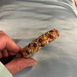 Red and Orange Gemstone Bracelet with Intricate Design